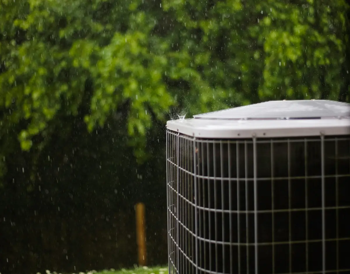Residential outdoor AC condenser installed at a North York home