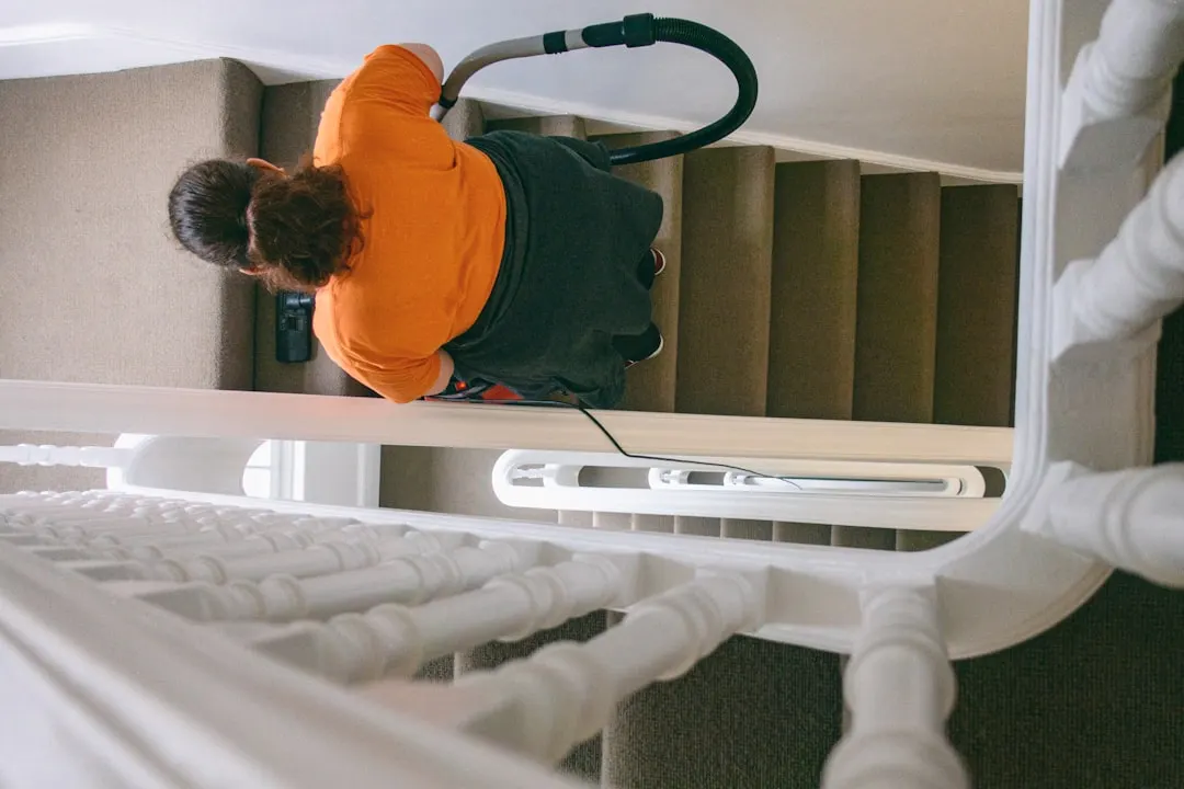 Duct cleaning technician with HEPA vacuum in North York
