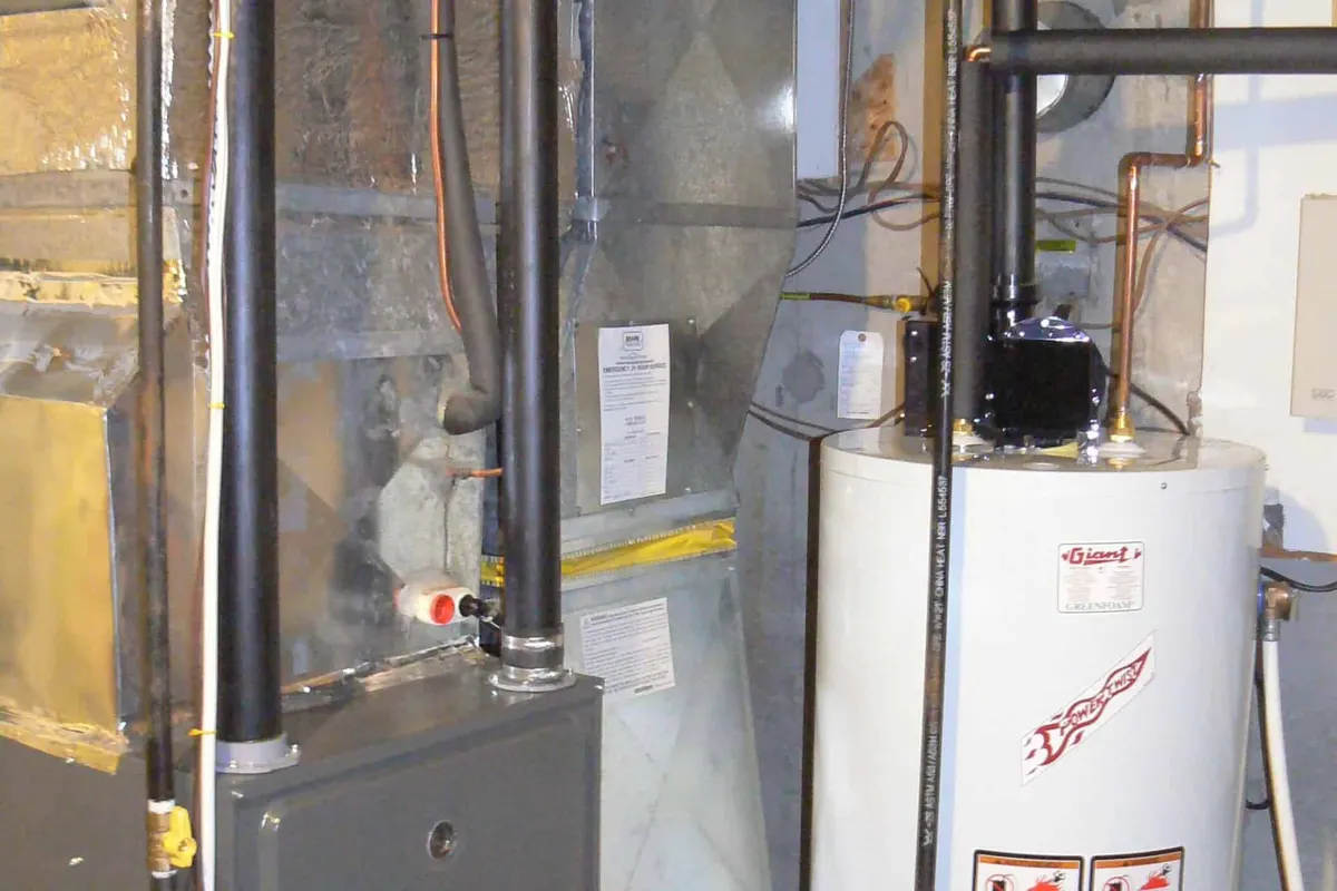 New high-efficiency gas furnace installed in a North York basement mechanical room