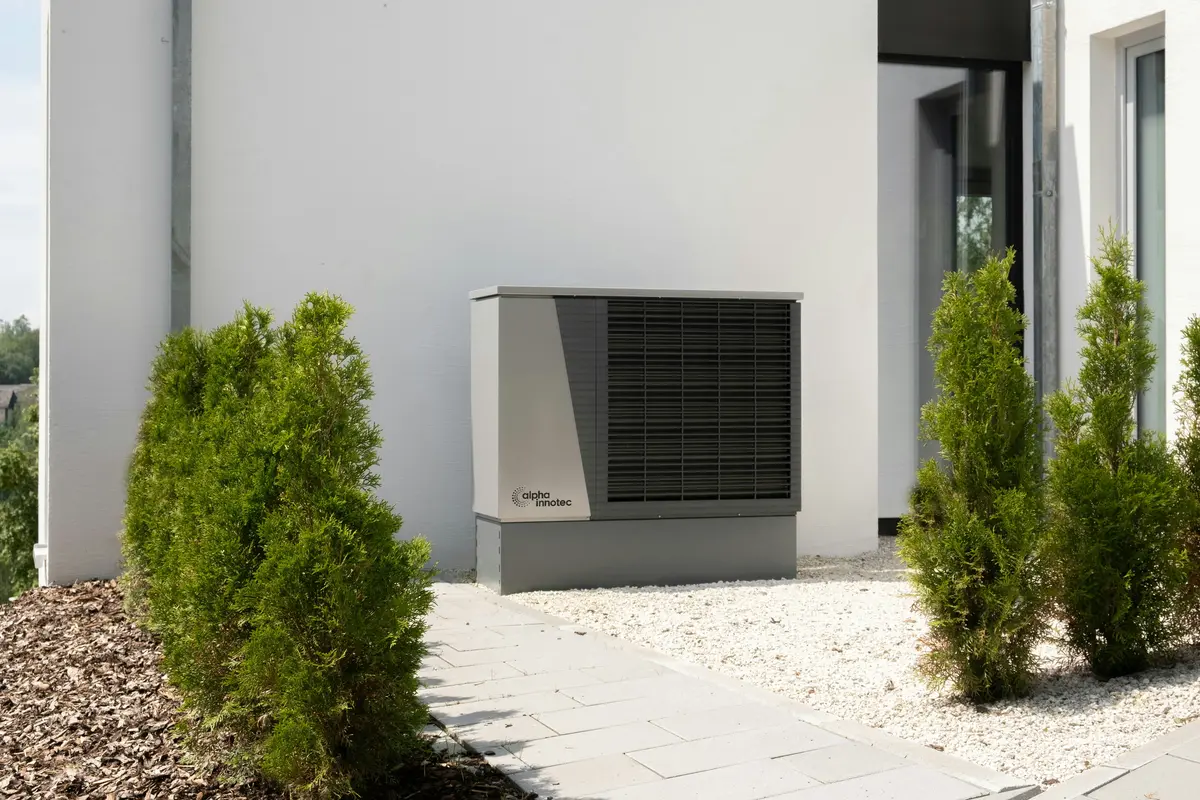 Cold-climate heat pump outdoor unit mounted on North York home exterior
