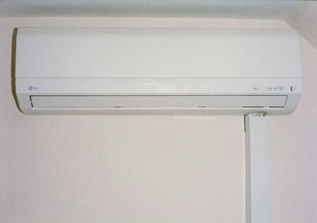 Wall-mounted ductless mini-split indoor unit in a North York living room