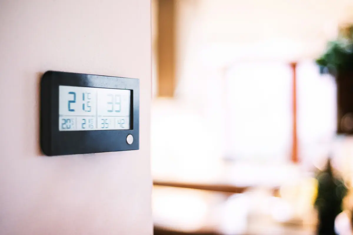 Modern smart thermostat on a residential wall in North York