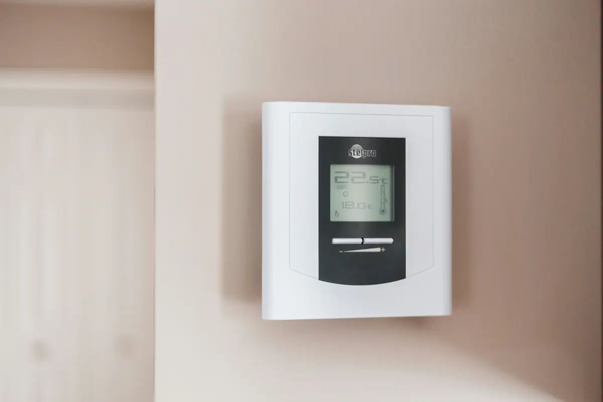 Smart thermostat installed on wall in a North York home